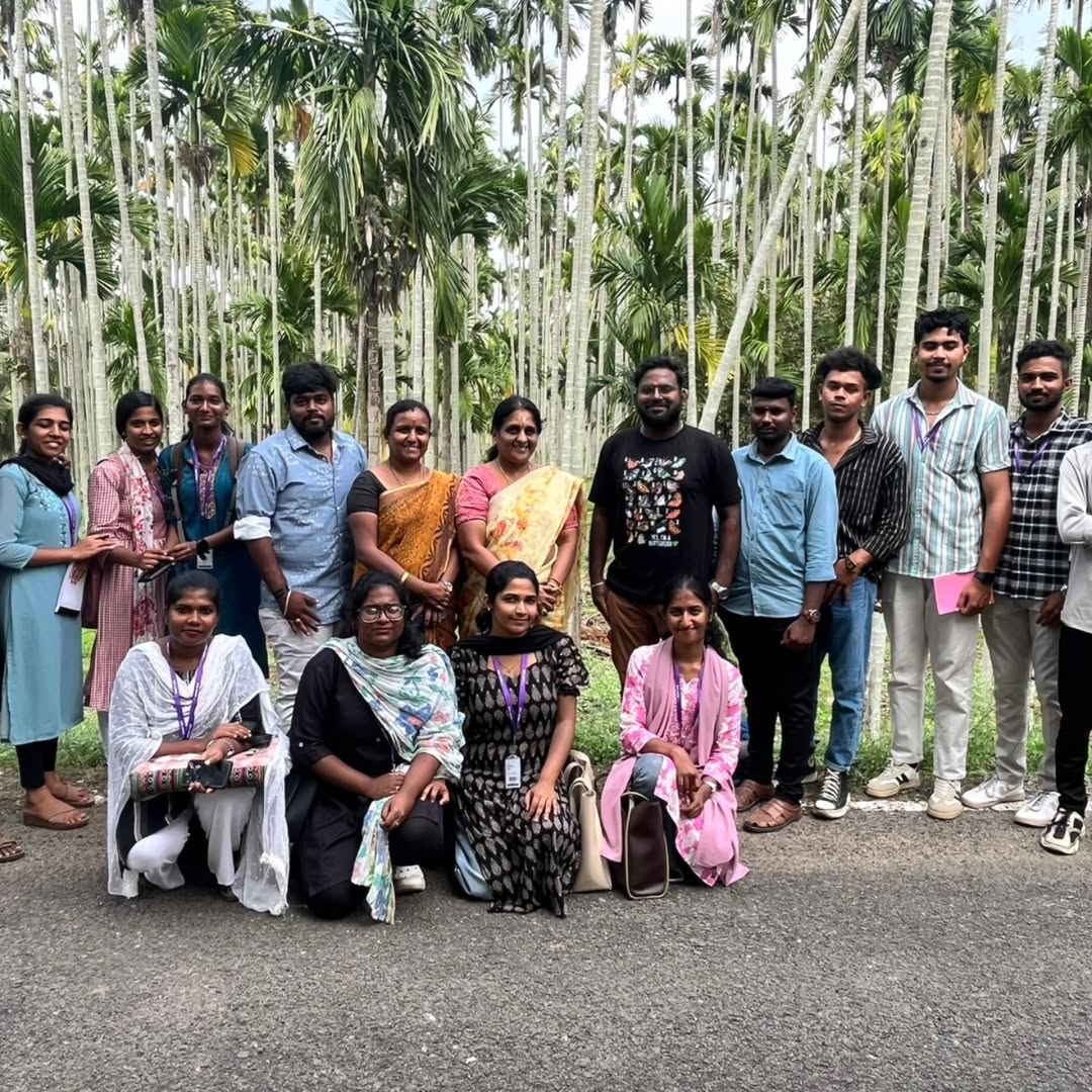 Students removing plastic from riverbank